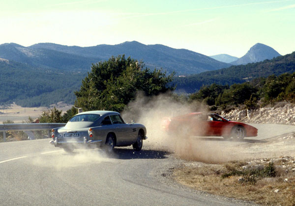 James Bond chases Xenia Onatopp through France, he in his Aston Martin DB5 and she in a Ferrari.